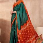 Rhapsody Rama Ajrakh Printed Semi Modal Silk Saree With Staggering Blouse Piece