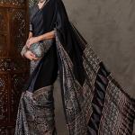 Prettiest Black Ajrakh Printed Semi Modal Silk Saree With Allure Blouse Piece