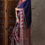 Exceptional Navy Blue Ajrakh Printed Semi Modal Silk Saree With Flameboyant Blouse Piece
