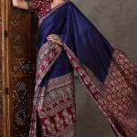 Exceptional Navy Blue Ajrakh Printed Semi Modal Silk Saree With Flameboyant Blouse Piece