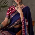 Exceptional Navy Blue Ajrakh Printed Semi Modal Silk Saree With Flameboyant Blouse Piece