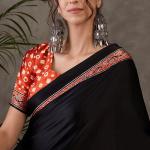 Enticing Black Ajrakh Printed Semi Modal Silk Saree With Winsome Blouse Piece