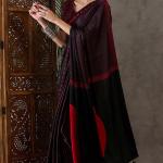 Diaphanous Black Ajrakh Printed Semi Modal Silk Saree With Majestic Blouse Piece