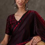 Diaphanous Black Ajrakh Printed Semi Modal Silk Saree With Majestic Blouse Piece