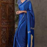 Most Flattering Blue Ajrakh Printed Semi Modal Silk Saree With Adorable Blouse Piece