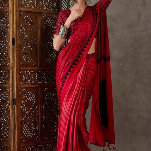 Ornate Red Ajrakh Printed Semi Modal Silk Saree With Alluring Blouse Piece