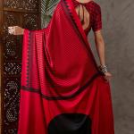Ornate Red Ajrakh Printed Semi Modal Silk Saree With Alluring Blouse Piece