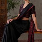 Super classy Black Ajrakh Printed Semi Modal Silk Saree With Symmetrical Blouse Piece