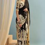 Mesmerising Black Ajrakh Printed Semi Modal Silk Saree With Unequalled Blouse Piece