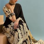 Mesmerising Black Ajrakh Printed Semi Modal Silk Saree With Unequalled Blouse Piece