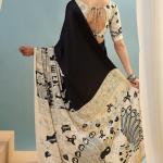 Mesmerising Black Ajrakh Printed Semi Modal Silk Saree With Unequalled Blouse Piece