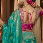 Nectarous Turquoise Banarasi Satin Silk Saree With Glowing Blouse