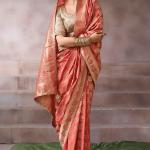 Pulsating Peach Banarasi Satin Silk Saree With Demure Blouse