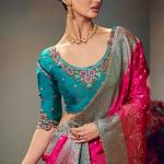 Pretty Dark Pink Banarasi Satin Silk Saree With Cynosure Blouse Piece