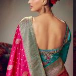 Pretty Dark Pink Banarasi Satin Silk Saree With Cynosure Blouse Piece