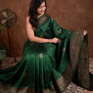 Surpassing Dark Green Soft Silk Saree With Dazzling Blouse Piece