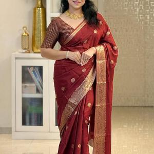 Intricate Maroon Soft Silk Saree With Confounding Blouse Piece