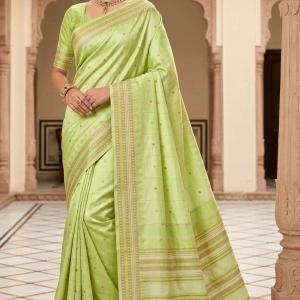 Intricate Pista Soft Silk Saree With Improbable Blouse Piece