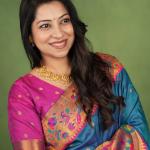 Flaunt Rama Paithani Silk Saree With Jubilant Blouse Piece