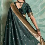 Prominent Dark Green Paithani Silk Saree With Whimsical Blouse Piece