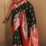 Engrossing Dark Green Pure Zari Weaving Banarasi Silk Saree With Comely Blouse Piece