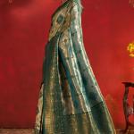 Pleasant Green Kanjivaram Silk Saree With Incredible Blouse Piece
