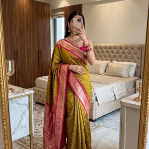 Transcendent Mustard Pure Banarasi Silk Saree With Redolent Blouse Piece