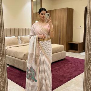 Efflorescence Peach Linen Silk Saree With Angelic Blouse Piece