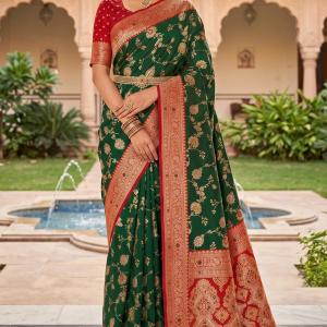 Lustrous Dark Green Pure Zari Weaving Banarasi Silk Saree With Beguiling Blouse Piece