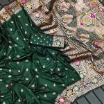 Gossamer Dark Green Soft Banarasi Silk Saree With Lagniappe Blouse Piece