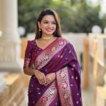 Sonorous Wine Soft Banarasi Silk Saree With Nectarous Blouse Piece