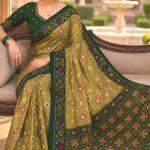 Engaging Green Patola Silk Saree with Smart Blouse Piece