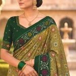 Engaging Green Patola Silk Saree with Smart Blouse Piece