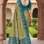 Divine Pista Patola Silk Saree with Vibrant Blouse Piece