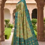 Divine Pista Patola Silk Saree with Vibrant Blouse Piece