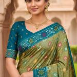 Divine Pista Patola Silk Saree with Vibrant Blouse Piece