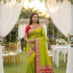 Engaging Parrot Pure Zari Weaving Banarasi Silk Saree With Majesty Blouse Piece
