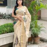 Beige Soft Banarasi Saree with Majestic Peacock Print – Elegant Traditional Wear for Women