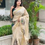 Beige Soft Banarasi Saree with Majestic Peacock Print – Elegant Traditional Wear for Women