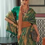 Sensational Rama Kanjivaram Silk Saree With Flattering Blouse Piece