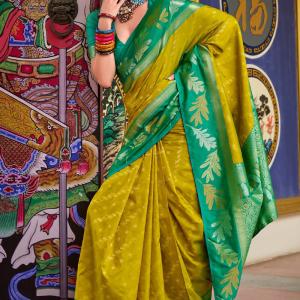 Impressive Mehndi Soft Banarasi Silk Saree With Arresting Blouse Piece