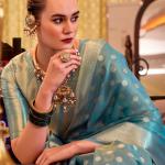Forbearance Firozi Soft Banarasi Tissue Silk Saree With Vestigial Blouse Piece