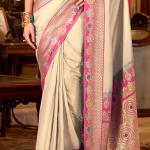 Twirling Beige Pure Zari Weaving Banarasi Silk Saree With Devastating Blouse Piece