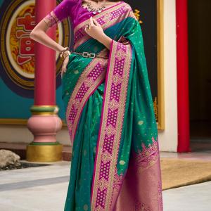 Surpassing Dark Green Soft Banarasi Silk Saree With Supernal Blouse Piece