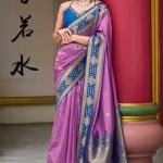 Exquisite Lavender Soft Banarasi Silk Saree With Splendorous Blouse Piece