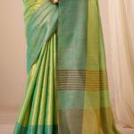 Murmurous Green Banarasi Tissue Silk Saree With Sonorous Blouse Piece