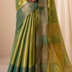 Zephyr Dark Green Banarasi Tissue Silk Saree With Exemplary Blouse Piece