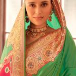 Fugacious Dark Green Soft Banarasi Silk Saree With Opulent Blouse Piece