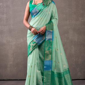 Inspiring Turquoise Cotton Silk Saree With Radiant Blouse Piece