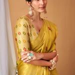 Stunning Yellow Banarasi Tissue Silk Saree With Snazzy Blouse Piece